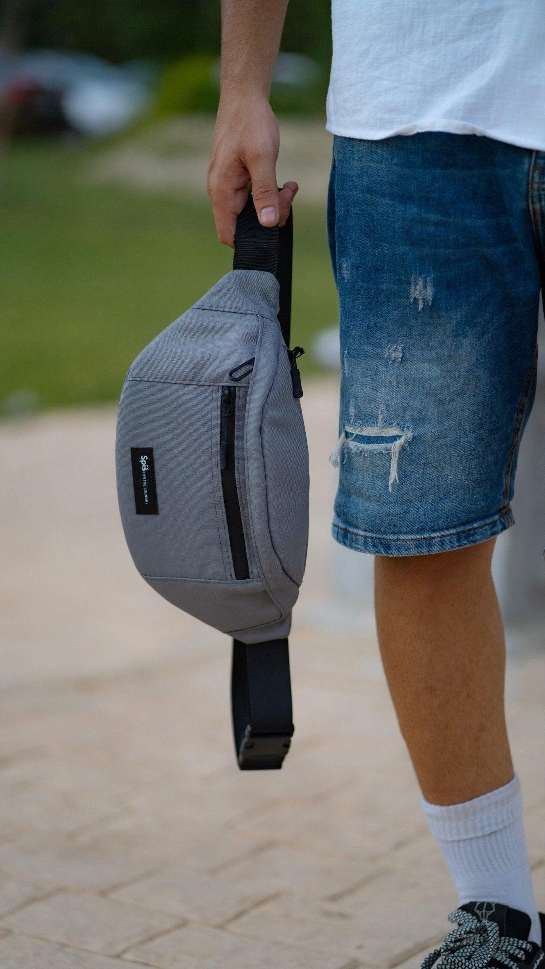 waist bag - on hands